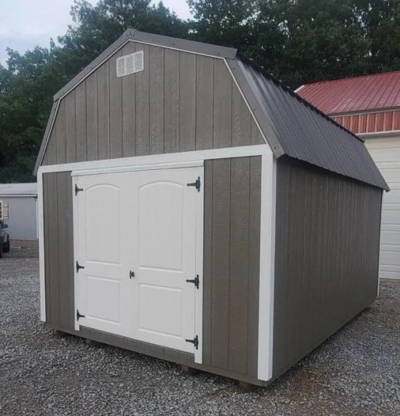 12'X16' Lofted Barn with
1 - 6' Double Fiberglass Door
Pay the down payment of $200.00 and get free delivery up to 50 miles from the Jonesboro lot.