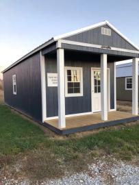 Envision what you could do with this nice blue and white cabin. After a low down payment of $300.00 we delivery it free within 50 miles of our Jonesboro lot.